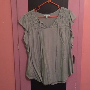 Ocean green color, blouse with detailing on top.